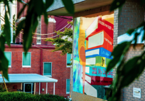 Library Mural by Bella Steiert on Commerce Street